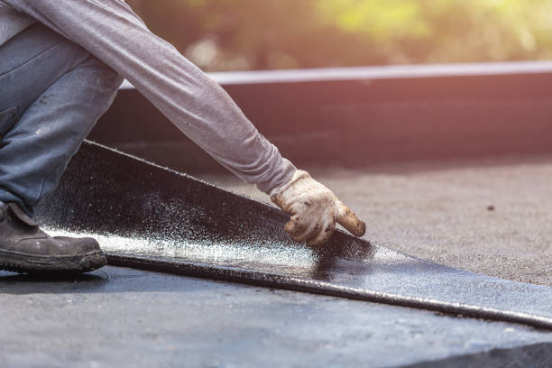 Professional Basement Waterproofing technician working in Mickleton, NJ
